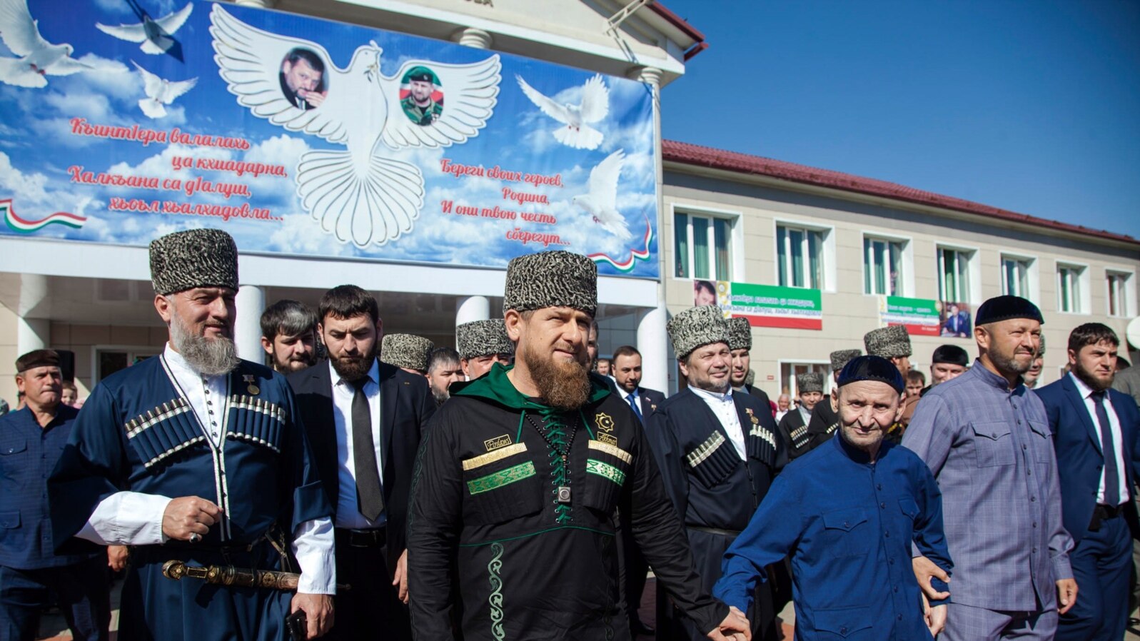 Chechnya -- Chechen leader Ramzan Kadyrov (C) leaves a polling station in the village of Tsentaroi during Russian parliament elections, September 18, 2016