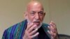 Former Afghan President Hamid Karzai gives an interview to the Associated Press at his house in Kabul on June 20. 