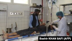 A person injured in the airstrike in Kunduz is treated at a local hospital.