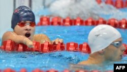 Євгеній Богодайко (л), срібна медаль у плаванні