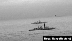 An infrared red image taken from a helicopter shows the Royal Navy frigate HMS St Albans escorting the Russian warship Admiral Gorshkov as it passes close to U.K territorial waters in the North Sea on December 25. 