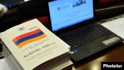 Armenia - A copy of the draft state budget for 2015 lying on a parliament deputy's desk, Yerevan, 1Dec2014.