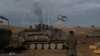 Ushtarë izraelitë hedhin predha nga jugu i Izraelit në drejtim të Rripit të Gazës, nga një pozicion në afërsi të kufirit Izrael-Gazë, 3 janar 2024.