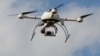 Бордода өткен көрмеде ұшып жүрген дрон. Франция, 9 қыркүйек 2014 жыл.