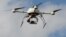Бордода өткен көрмеде ұшып жүрген дрон. Франция, 9 қыркүйек 2014 жыл.