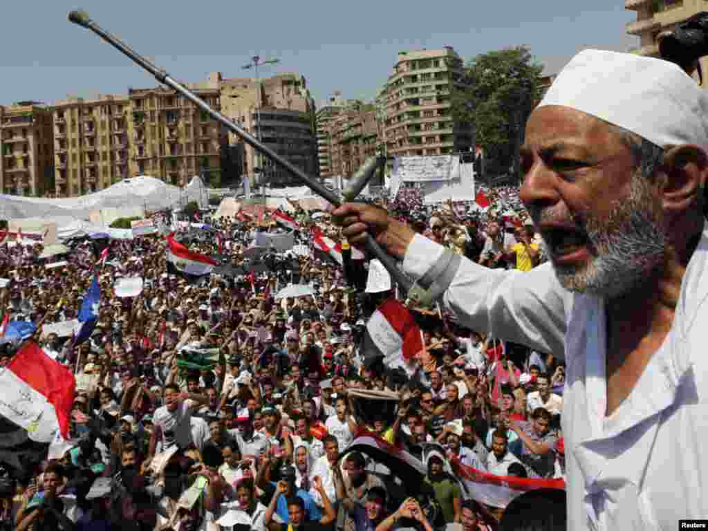 An Egyptian protester chants against the former regime in Tahrir Square in Cairo. Thousands of Egyptians gathered in the iconic square to demand faster reforms and the swifter prosecution of former officials from Hosni Mubarak's toppled government who face corruption and murder charges.Photo by Mohamed Abd El-Ghany for Reuters