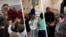 Moldova: Vladimir Cebotari, primary school teacher; Gheorghe Slubschi, kindergarten educator; and priest Oleg Lișciuc, who has also taken on the role of social worker.