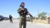 Afghan army soldiers at a check post during the Eid al-Fitr holiday.