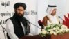 FILE: Muhammad Naeem (L), a spokesman for the Taliban contact office in Doha.