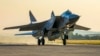 A Russian MiG-31 fighter jet carrying a Kinzhal missile takes off from the Hemeimeem air base in Syria in 2021. 