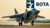 Një avion luftarak rus MiG-31, i pajisur me një raketë Kinzhal, ngrihet nga baza ajrore Hemeimeem në Siri në vitin 2021.