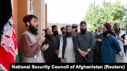 FILE: Taliban prisoners gather inside the Pul-e-Charkhi prison in Kabul on August 13.