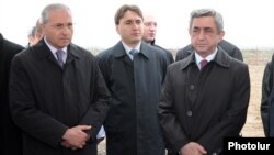 Armenia -- President Serzh Sarkisian (R) and Agriculture Minister Sergo Karapetian (L) visit Armavir province, April 7, 2011.