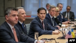 US Secretary of State Marco Rubio (center) sits next to US special envoy Steve Witkoff (second left) during discussions with a Ukrainian delegation in Geneva on a US plan to end the war in Ukraine. 