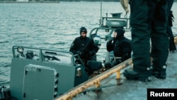 Latvian and Finnish naval divers take part in a NATO exercise aimed at detecting sabotage. (file photo)