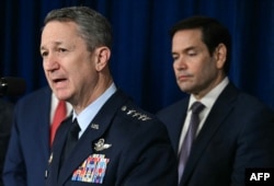 Dan Caine, șeful Comitetului șefilor de stat major din Armata SUA, la conferința de presă din 3 ianuarie 2026.