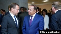 Belarus - Prime Ministers Dmitry Medvedev of Russia and Hovik Abrahamian of Armenia speak on the sidelines of a Eurasian Economic Union meeting in Grodno, 8Sep2015.