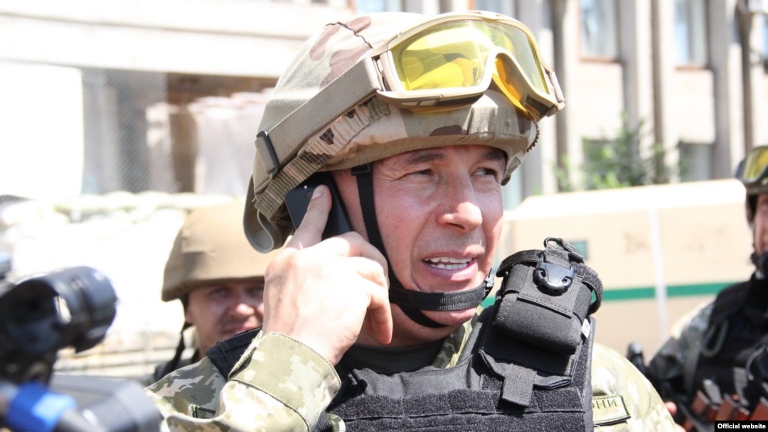Ukrainian Defense Minister Valeriy Heletey in combat uniform in Slovyansk in July