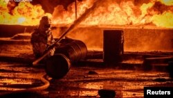 Një fotografi e publikuar nga autoritetet rajonale më 18 gusht shfaq pasojat e një sulmi me rus me dronë në Odesa të Ukrainës.