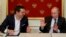 Greek Prime Minister Alexis Tsipras (left) speaks with Russian President Vladimir Putin during a signing ceremony at the Kremlin in Moscow in April.