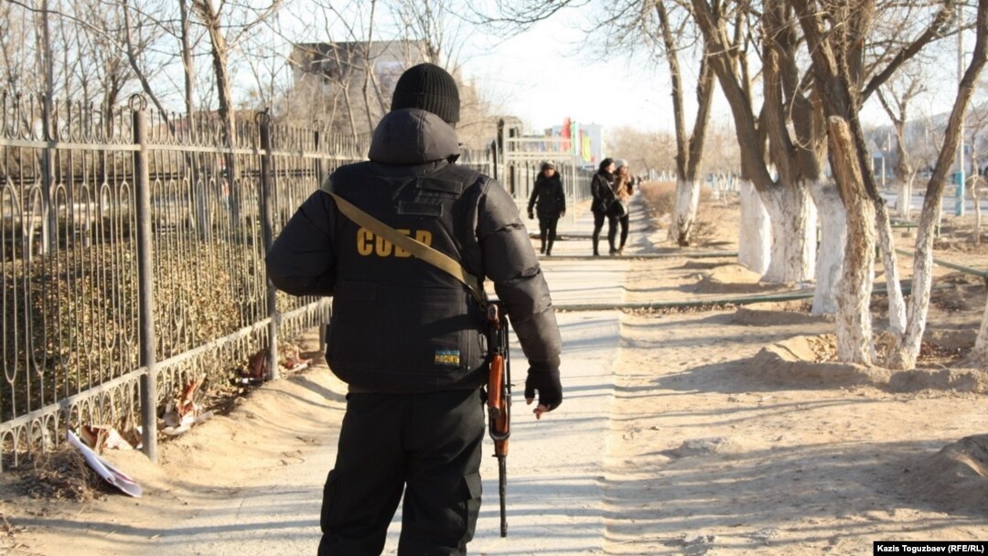 A police officer patrols the streets of Zhanaozen in December 2011, days after the clashes that killed 16 people.