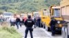 KOSOVO -- Kosovo special police stand on the road near the northern Kosovo border crossing of Jarinje, September 20, 2021