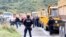 KOSOVO -- Kosovo special police stand on the road near the northern Kosovo border crossing of Jarinje, September 20, 2021