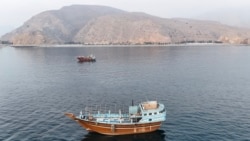 Boats lie anchored off Oman’s northern Musandam Peninsula near the Strait of Hormuz on June 27. 