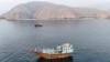 Boats are anchored off Oman’s northern Musandam Peninsula near the Strait of Hormuz on June 27.