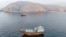 Boats are anchored off Oman’s northern Musandam Peninsula near the Strait of Hormuz on June 27.