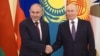 Russian President Vladimir Putin (right) welcomes Armenian Prime Minister Nikol Pashinian in St. Petersburg in December 2025. The EU has warned of Russia's "destabilizing tactics" in Armenia ahead of parliamentary elections in June. 