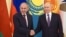 Russian President Vladimir Putin (right) welcomes Armenian Prime Minister Nikol Pashinian in St. Petersburg in December 2025. The EU has warned of Russia's "destabilizing tactics" in Armenia ahead of parliamentary elections in June. 