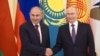 Russian President Vladimir Putin (right) welcomes Armenian Prime Minister Nikol Pashinian in St. Petersburg in December 2025. The EU has warned of Russia's "destabilizing tactics" in Armenia ahead of parliamentary elections in June. 