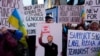 People attend a demonstration to mark three years since the Russian invasion of Ukraine on Times Square in New York City on February 24.