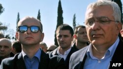 Пратениците на опозицискиот Демократскиот фронт Андрија Мандиќ и Милан Кнежевиќ, осомничени за заговор против Црна Гора. 