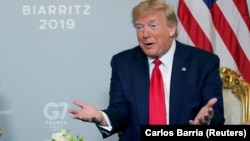 U.S. President Donald Trump speaks to the press in Biarritz on August 26.