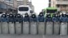 Armenia -- Riot police are seen outside the Armenian parliament building in Yerevan during opposition protests, March 10, 2021.