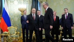 Russian President Vladimir Putin and Kazakh President Qasym-Zhomart Toqaev meet at the Kremlin in Moscow on November 12 as part of a state visit. 