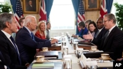 British Prime Minister Keir Starmer (right) and Foreign Secretary David Lammy (second right) during a meeting with U.S. President Joe Biden (center left) and Secretary of State Antony Blinken (left) at the White House on September 13.