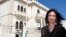 Maltese investigative journalist Daphne Caruana Galizia poses outside the Libyan Embassy in Valletta in April 2011.