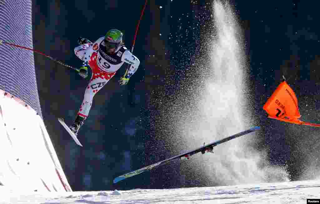 First Prize Singles in the Sports category was won by Austrian photographer Christian Walgram for his image of Czech skier Ondrej Bank crashing at speed while competing in the FIS World Championships. (February 8, 2015)