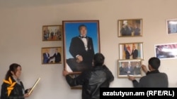 Armenia - Pictures of Kazakhstan's President Nursultan Nazarbayev are removed from a public library in the village of Harich, 18Apr2016.