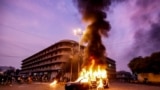 A police vehicle is set ablaze by members and supporters of the Tehreek-e-Labbaik Pakistan (TLP) party during a protest in&nbsp;Karachi.&nbsp;