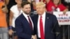 USA – Republican vice presidential candidate Sen. JD Vance, R-Ohio, left, and Republican presidential candidate former President Donald Trump, shake hands at a campaign rally at Georgia State University in Atlanta, Aug. 3, 2024