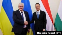 Andriy Sibiqa və Peter Siyarto