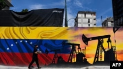 Patriotism și petrol la Caracas, într-o fotografie din 2022.