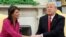 U.S. President Donald Trump greets UN Ambassador Nikki Haley in the Oval Office as the president accepted Haley's resignation on October 9.