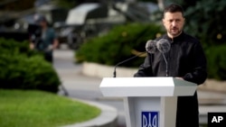 Ukrainian President Volodymyr Zelenskyy attends a ceremony for National Flag Day in Kyiv on August 23. 