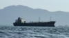 A ship off the port of Aden, Yemen, where traffic remained steady after Iran-aligned Houthis said their forces had carried out missile and drone strikes on Saudi oil tankers on July 23.