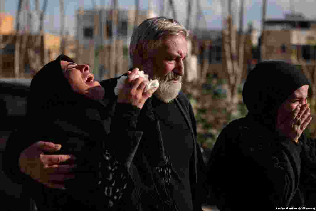 Relatives mourn at the April 12 funeral of four members of a family killed in an Israeli strike in Srifa, southern Lebanon.